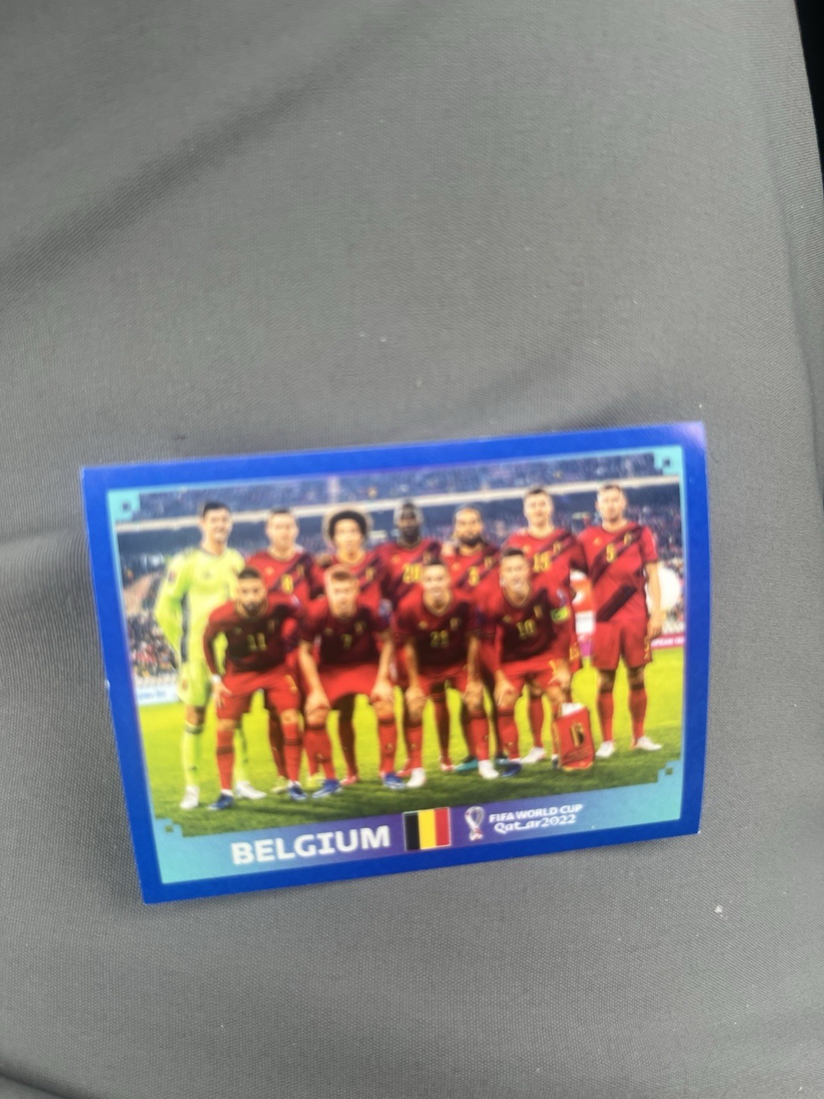 2022 Panini Qatar World Cup Sticker – BLUE Parallel Border BEL 1 BELGIUM TEAM