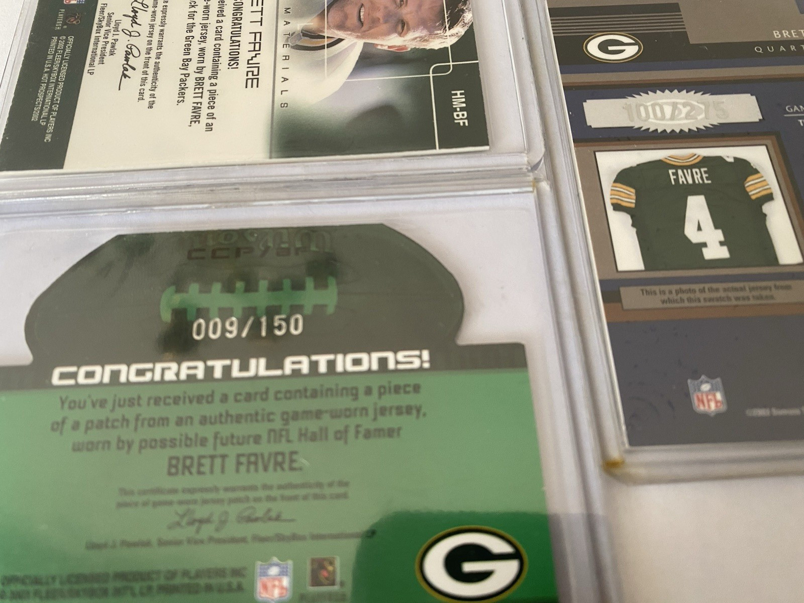 Brett Favre Multi color Game Used 3 Card Lot