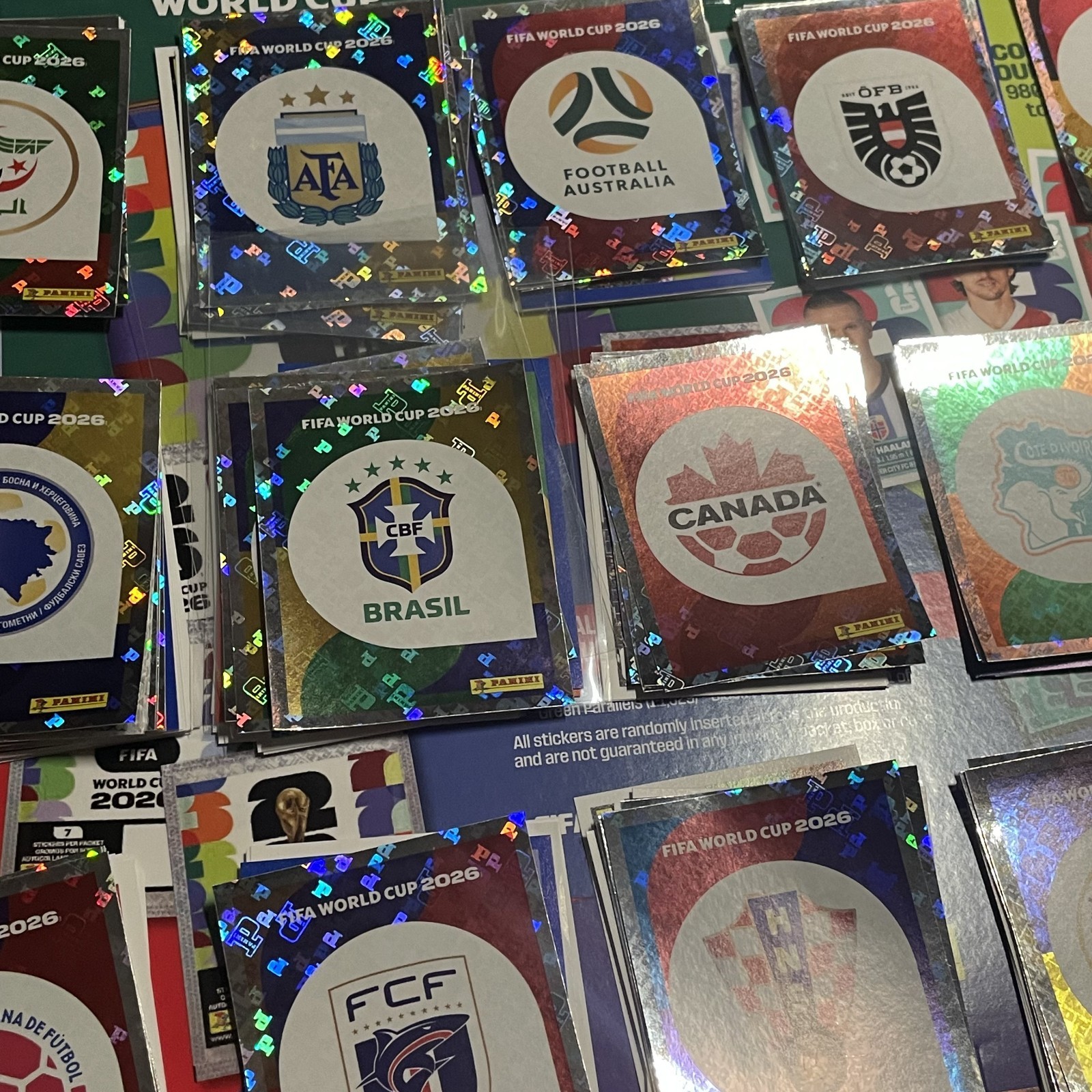 2026 Panini FIFA World Cup Stickers -You Pick- Team Foil Crest / Logo Mint