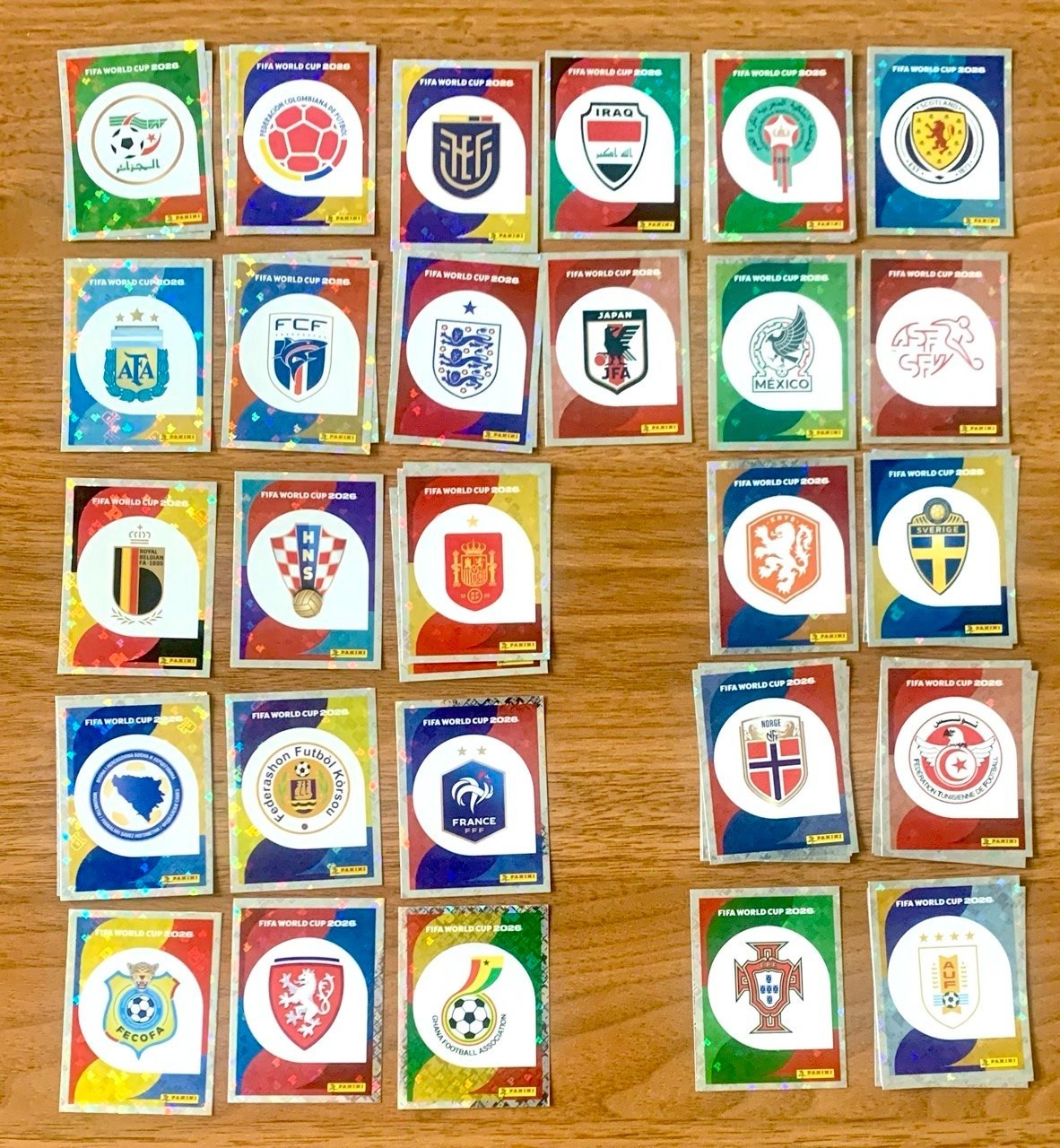 FIFA World Cup 2026 Panini Stickers Holo Team Logo Badges #1 – Pick Yours